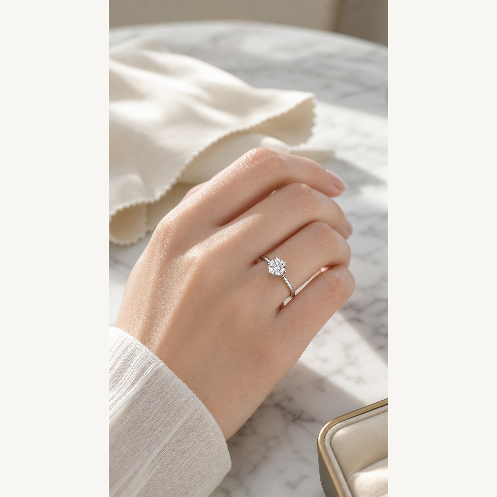 Lab-grown diamond solitaire ring shown on hand