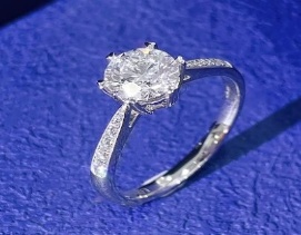 Oval-style side-stone ring front reference