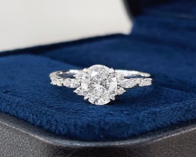 Floral side-stone ring front reference
