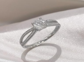 Four-prong side-stone ring front reference